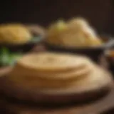 Freshly made corn tortillas on a wooden board